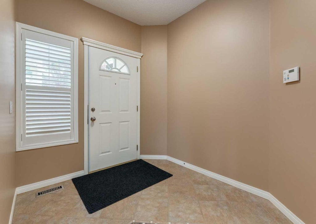 Photo of 115 Scimitar Heath NW, Calgary, AB T3L 2E1 (MLS # A2343999)