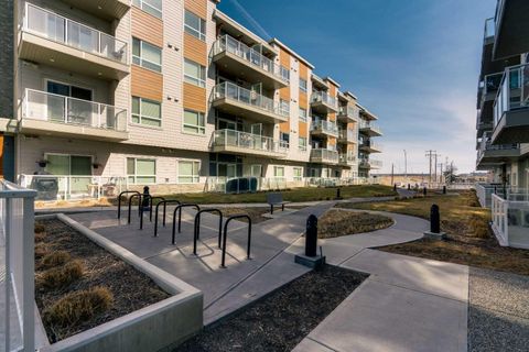 Photo of 200 Harvest Hills Place NE #410, Calgary, AB T3K 2N3 (MLS # A2296524)