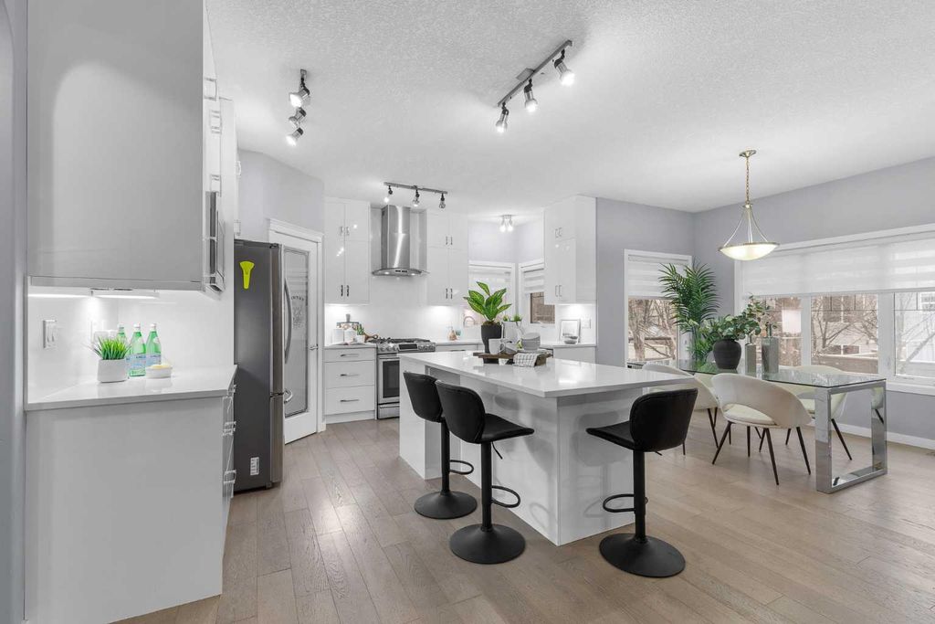 Photo of 1409 Kings Heights Boulevard SE, Airdrie, AB T4A 0A1 (MLS # A2275325)