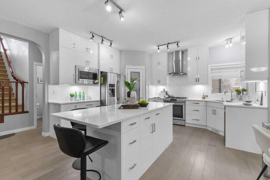 Photo of 1409 Kings Heights Boulevard SE, Airdrie, AB T4A 0A1 (MLS # A2275325)