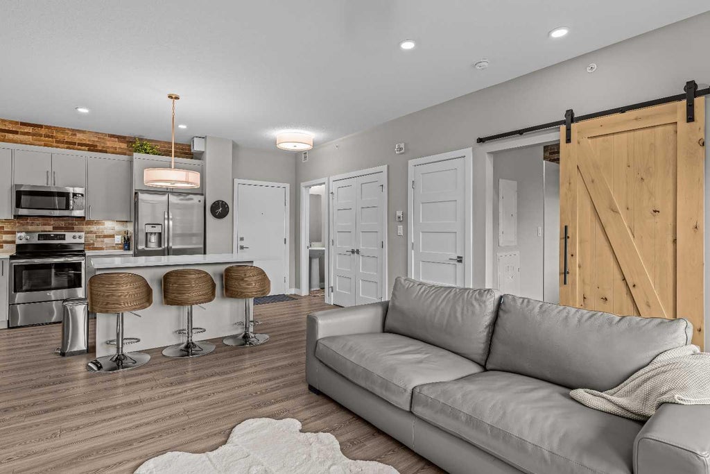 Photo of 106 Stewart Creek Rise #306, Canmore, AB T1W 0N3 (MLS # A2353784)