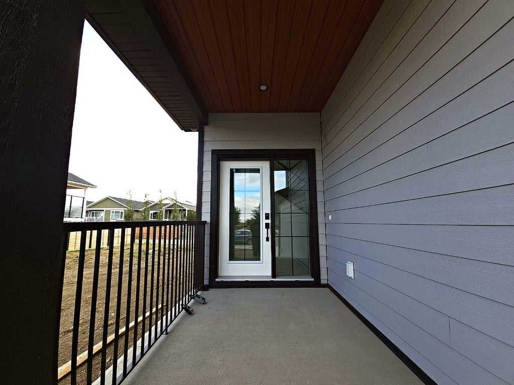Photo of 4566 40 Avenue S, Lethbridge, AB T1K 8G2 (MLS # A2343311)
