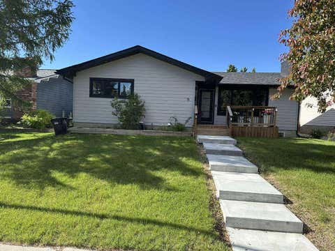 Photo of 15 Brookmere Place SW, Calgary, AB T2W 2P5 (MLS # A2297215)