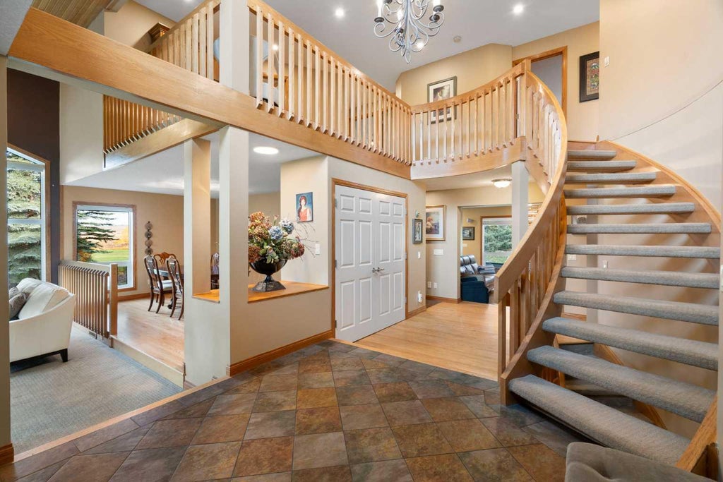Photo of 505 Bearspaw Village Ridge NW, Rural Rocky View County, AB T3L 2P1 (MLS # A2351863)
