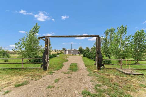 Photo of 210 Dunbar Avenue W, Bow Island, AB T0K 0G0 (MLS # A2336946)