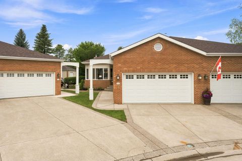 Photo of 12 Prominence Point SW, Calgary, AB T3H 3E8 (MLS # A2331955)