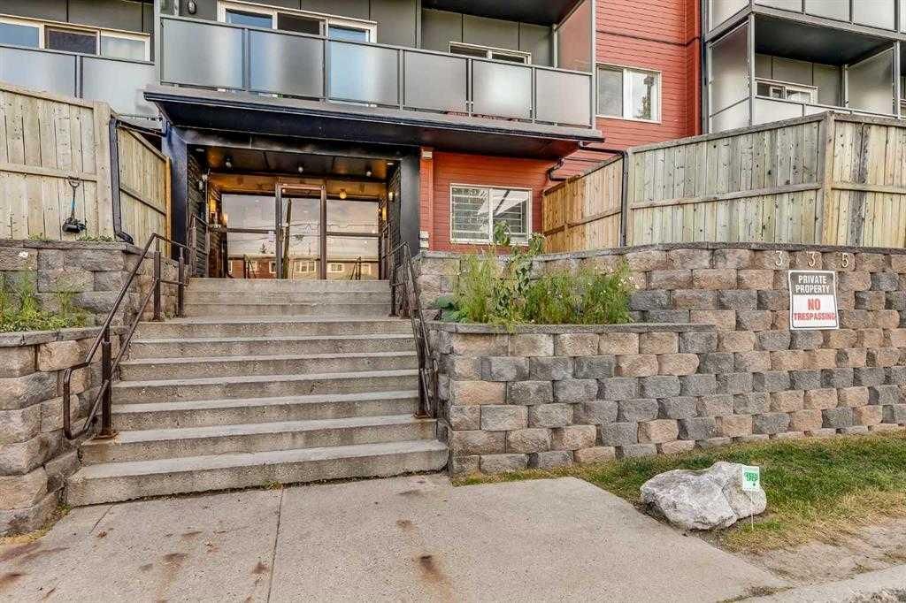 Photo of 335 Garry Crescent NE #104, Calgary, AB T2K 5X1 (MLS # A2310121)