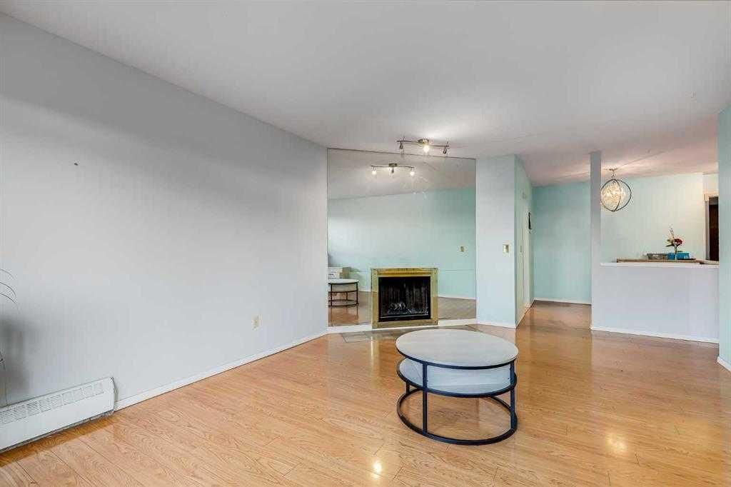 Photo of 335 Garry Crescent NE #104, Calgary, AB T2K 5X1 (MLS # A2310121)