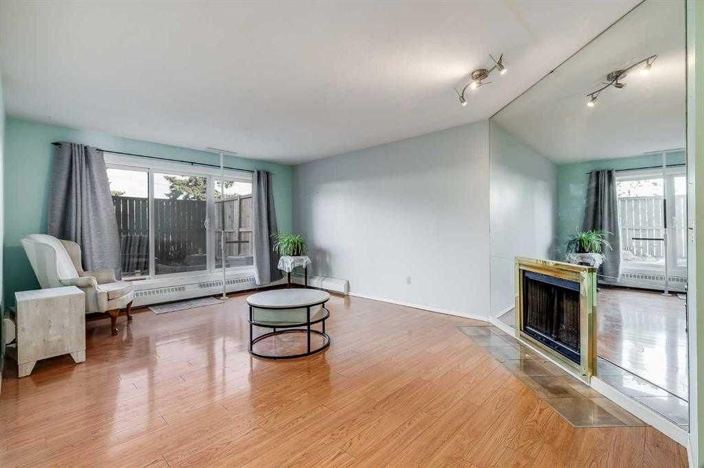Photo of 335 Garry Crescent NE #104, Calgary, AB T2K 5X1 (MLS # A2310121)