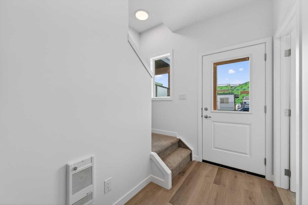 Photo of 32 Red Embers Plaza NE, Calgary, AB T3N 2W1 (MLS # A2295986)