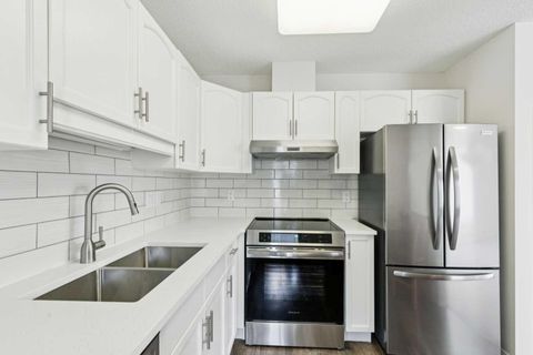 Photo of 2309 Hawksbrow Point NW #2309, Calgary, AB T3G 4C9 (MLS # A2306023)