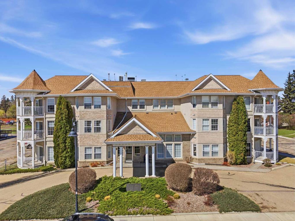 Photo of 5034 53 Street #8, Lacombe, AB T4L 2K7 (MLS # A2310464)