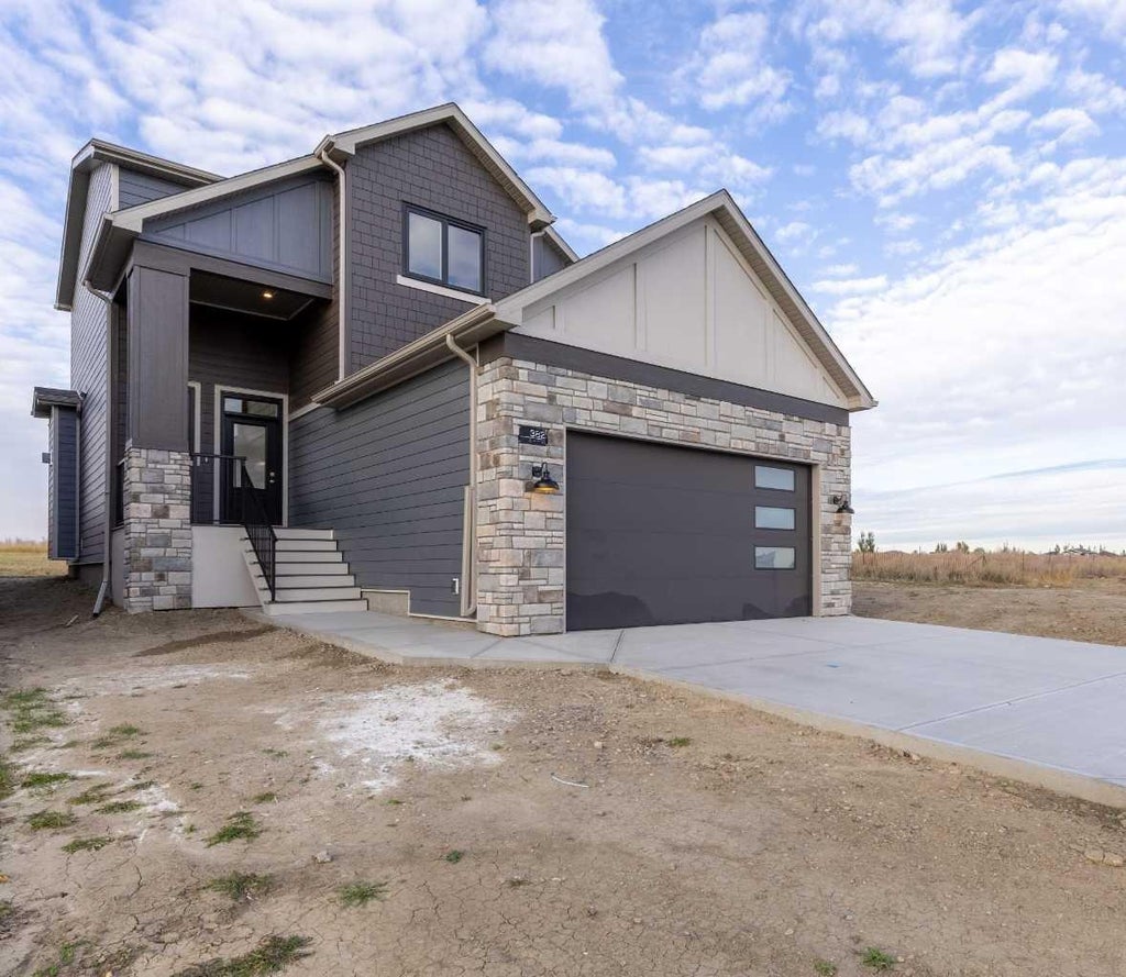 Photo of 382 Canyon Meadows Road W, Lethbridge, AB T1K 8E7 (MLS # A2353799)