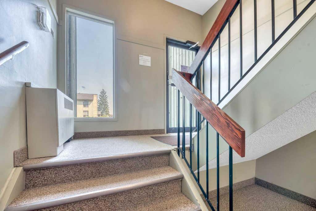 Photo of 10120 Brookpark Boulevard SW #111, Calgary, AB T2W 3G3 (MLS # A2338587)