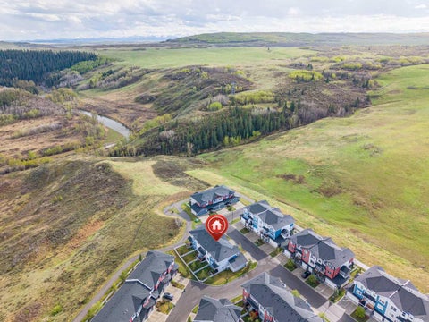 Photo of 1402 Jumping Pound Common, Cochrane, AB T4C 2L1 (MLS # A2340660)