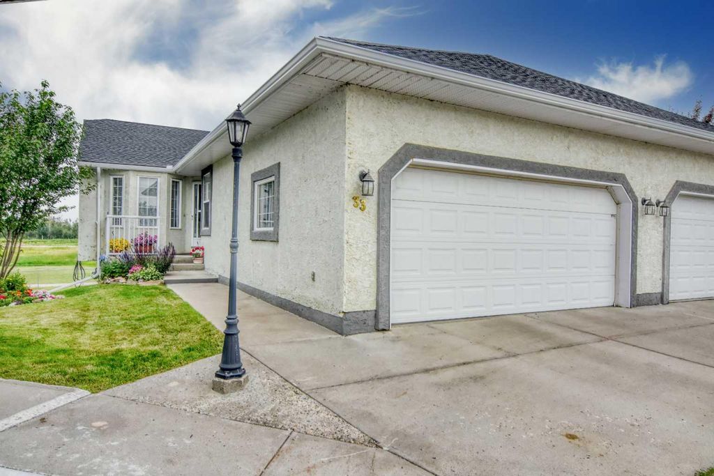 Photo of 33 Strathmore Lakes Bay, Strathmore, AB T1P 1L8 (MLS # A2329475)