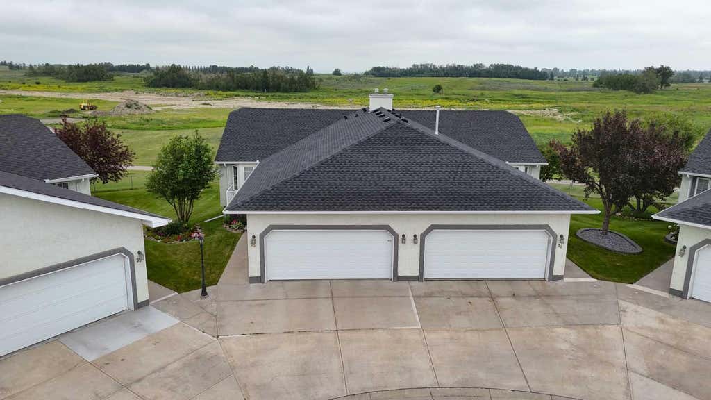 Photo of 33 Strathmore Lakes Bay, Strathmore, AB T1P 1L8 (MLS # A2329475)
