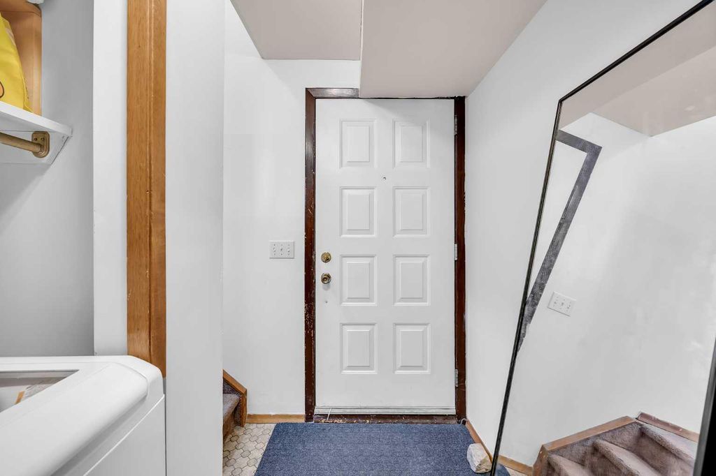 Photo of 49 Beacham Way NW, Calgary, AB T3K 1R7 (MLS # A2283200)