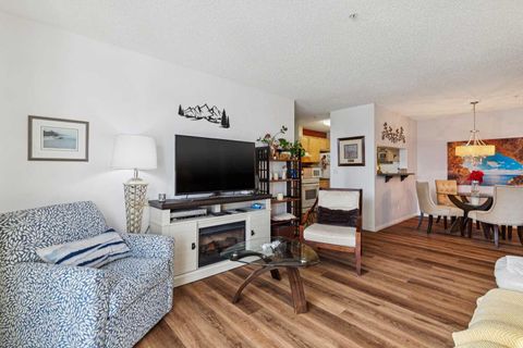Photo of 2022 Canyon Meadows Drive SE #106, Calgary, AB T2J 7H1 (MLS # A2298317)