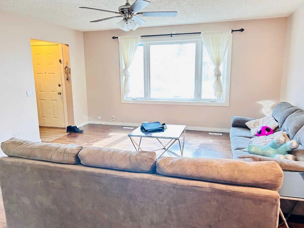 Photo of 223 Pineland Place NE, Calgary, AB T1Y 3L4 (MLS # A2299828)