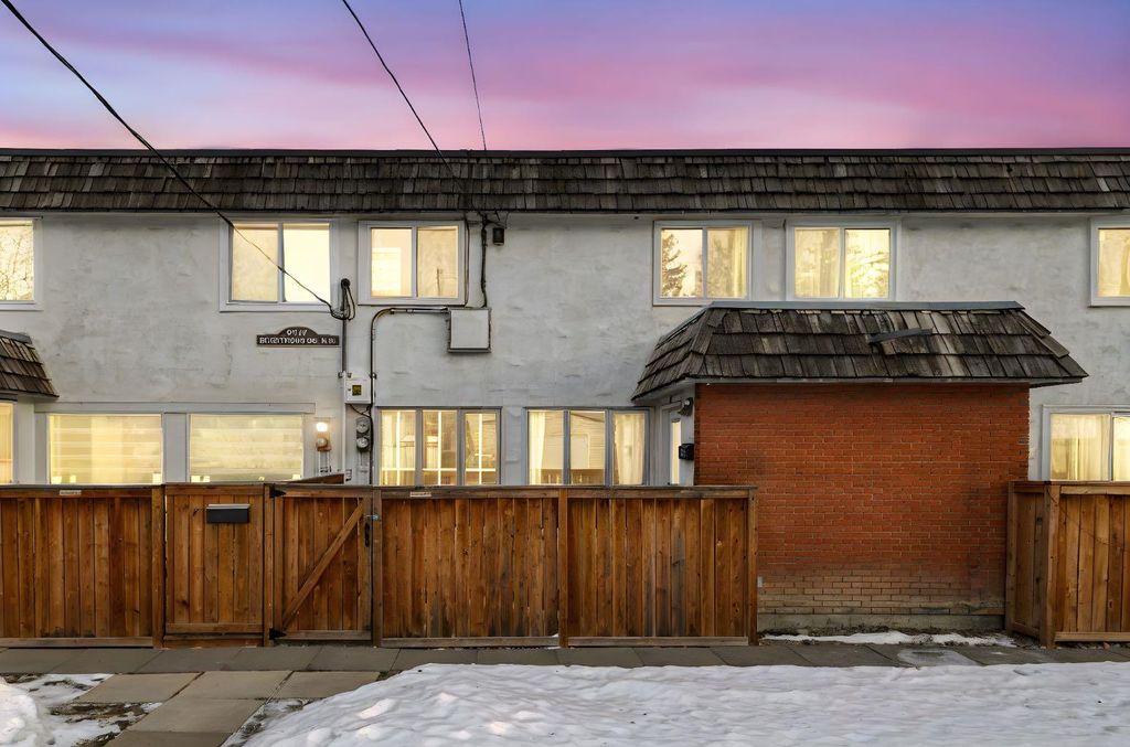 Photo of 6147 Buckthorn Road NW #6, Calgary, AB T2K 2Z2 (MLS # A2278314)