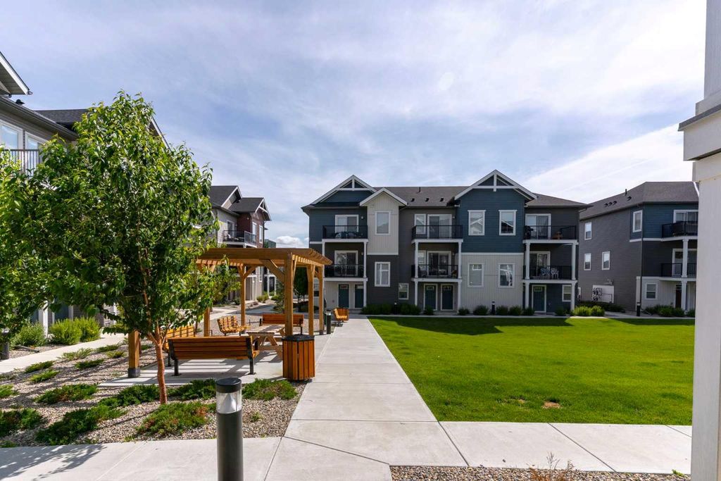 Photo of 24 Rivercrest Drive #602, Cochrane, AB T4C 2C5 (MLS # A2292589)