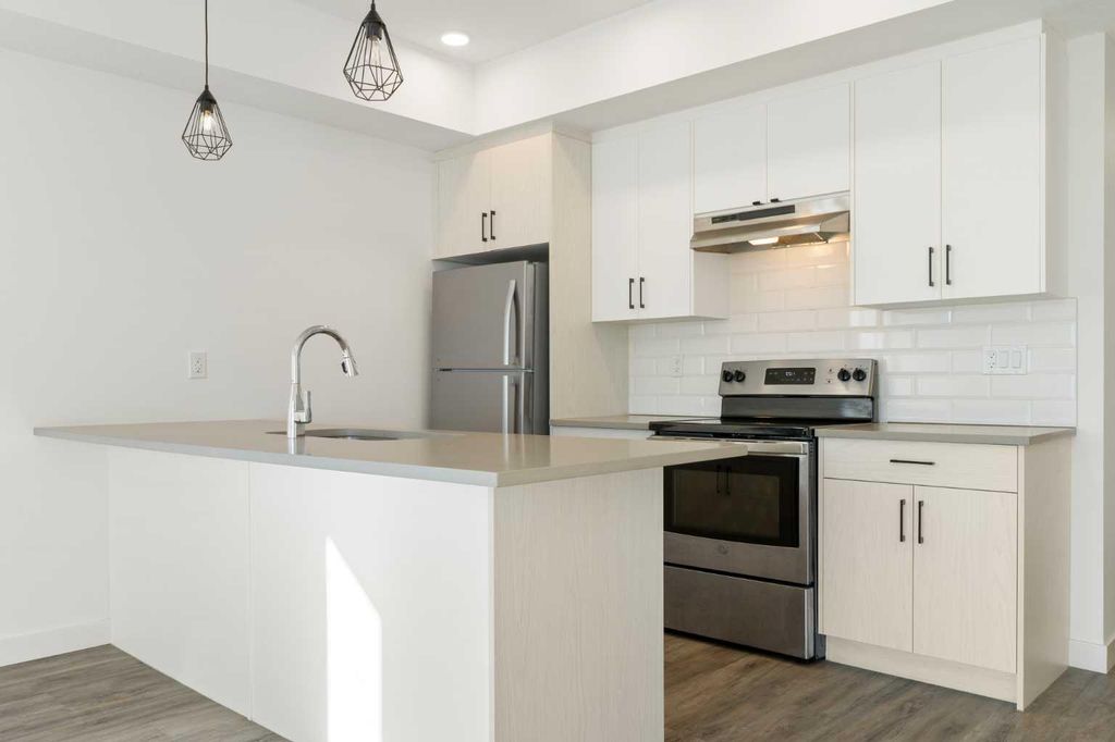 Photo of 24 Rivercrest Drive #602, Cochrane, AB T4C 2C5 (MLS # A2292589)