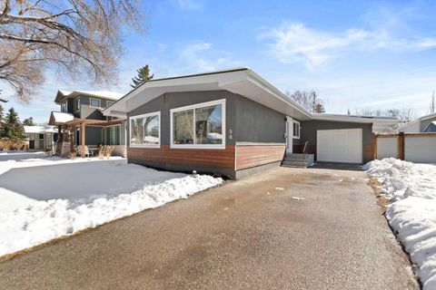 Photo of 38 Westwood Drive SW, Calgary, AB T3C 2V7 (MLS # A2299811)