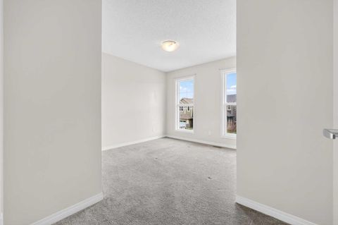Tiny photo for 99 Buckskin Way, Cochrane, AB T4C 2P2 (MLS # A2312754)