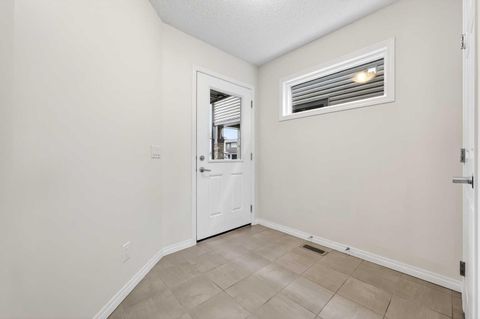 Tiny photo for 99 Buckskin Way, Cochrane, AB T4C 2P2 (MLS # A2312754)
