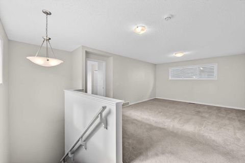 Tiny photo for 99 Buckskin Way, Cochrane, AB T4C 2P2 (MLS # A2312754)