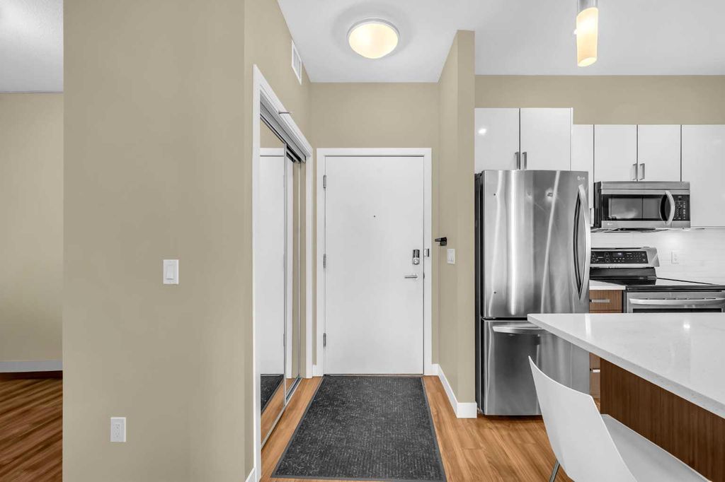 Photo of 16 Auburn Bay Link #405, Calgary, AB T3M 0E9 (MLS # A2272191)