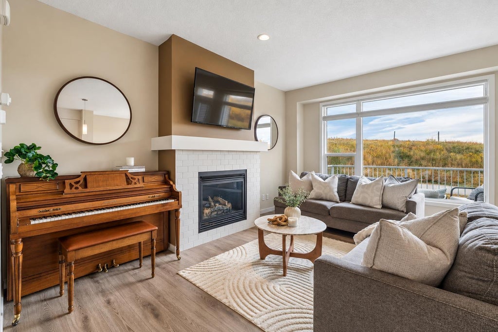Photo of 63 Fireside Crescent, Cochrane, AB T4C 2L4 (MLS # A2350680)