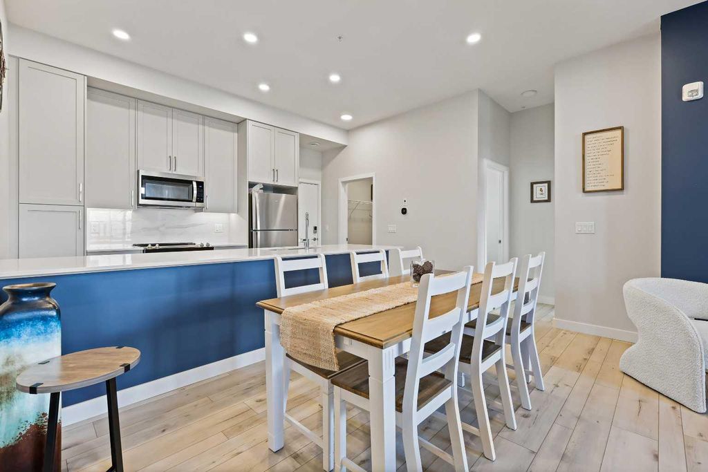 Photo of 255 Les Jardins Park SE #122, Calgary, AB T2C 5W9 (MLS # A2293228)