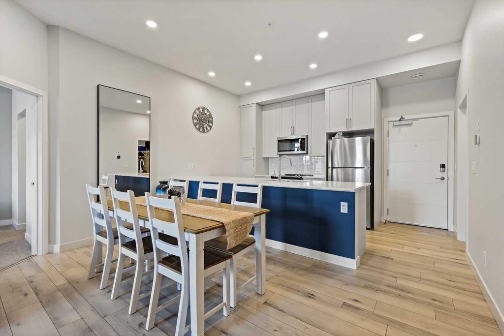 Photo of 255 Les Jardins Park SE #122, Calgary, AB T2C 5W9 (MLS # A2293228)