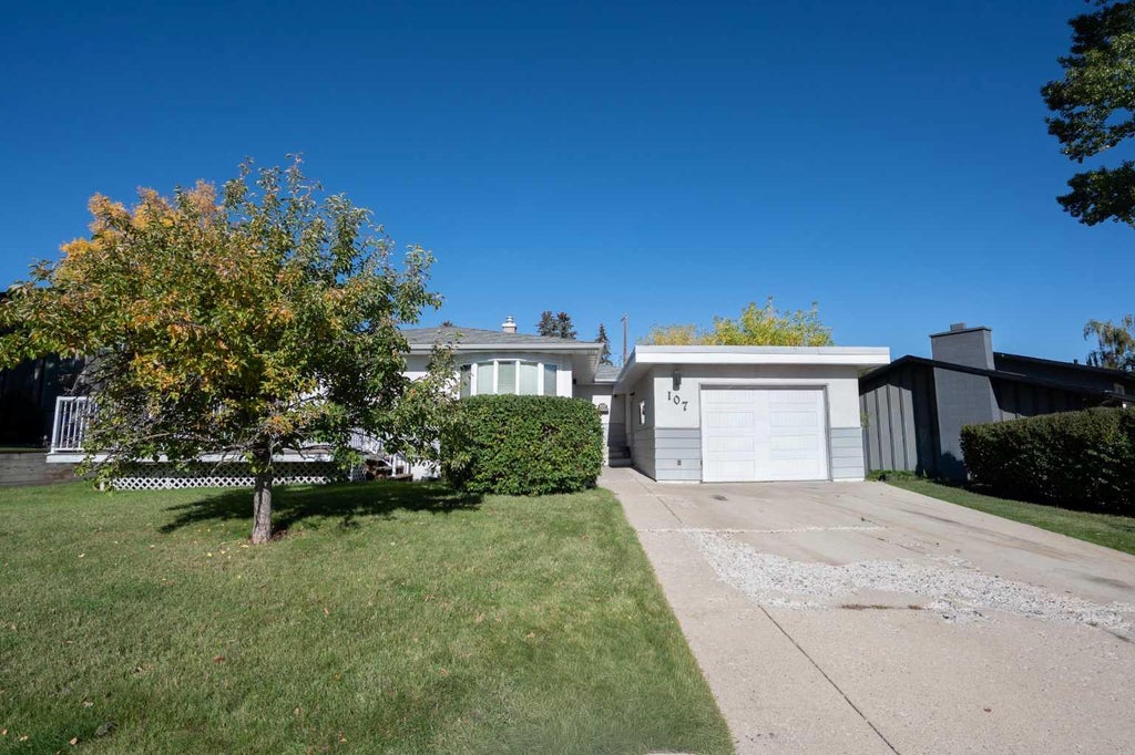 Photo of 107 Hallbrook Drive SW, Calgary, AB T2V 3H8 (MLS # A2346389)