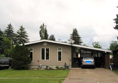 Photo of 4923 52 Avenue, Taber, AB T1G 1H6 (MLS # A2320485)