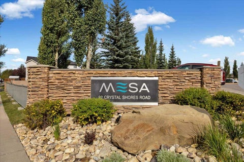 Photo of 92 Crystal Shores Rd #2408, Okotoks, AB T1S 2M9 (MLS # A2341912)