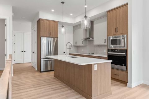 297 Riviera Way 88 Cochrane AB T4C 2A4