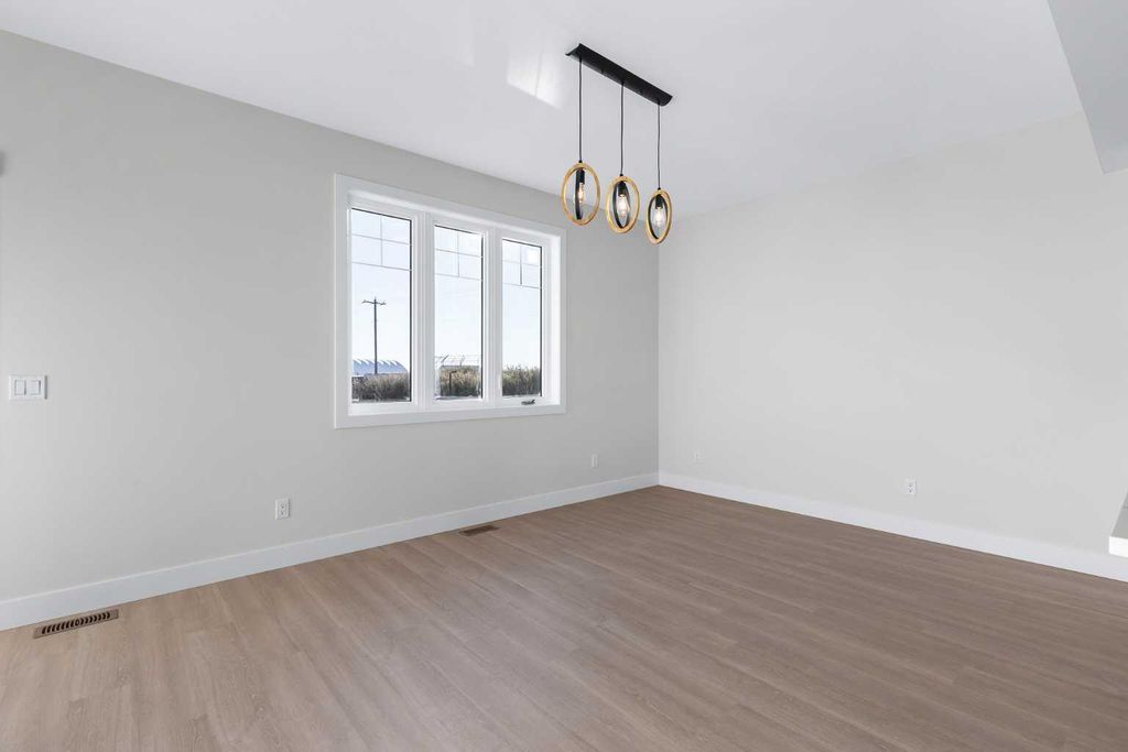 Photo of 1907 McCaskill Drive, Crossfield, AB T0M 0S0 (MLS # A2265845)