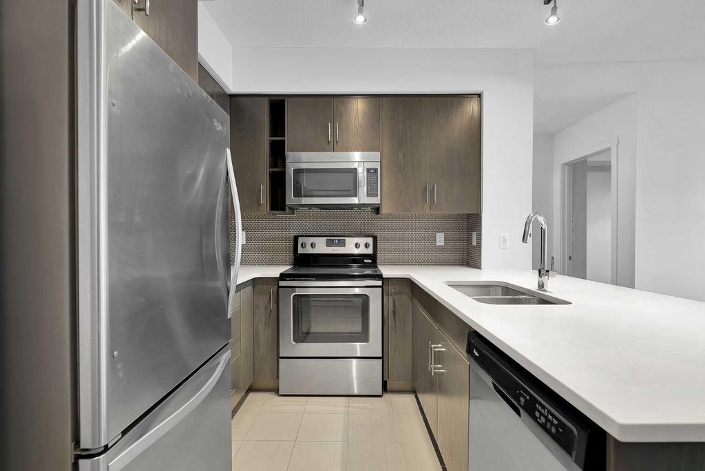 Photo of 25 Auburn Meadows Avenue SE #215, Calgary, AB T3M 2L3 (MLS # A2276754)