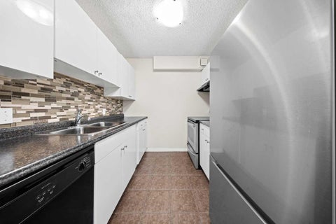 Photo of 718 12 Avenue SW #305, Calgary, AB T2R 0H7 (MLS # A2350564)