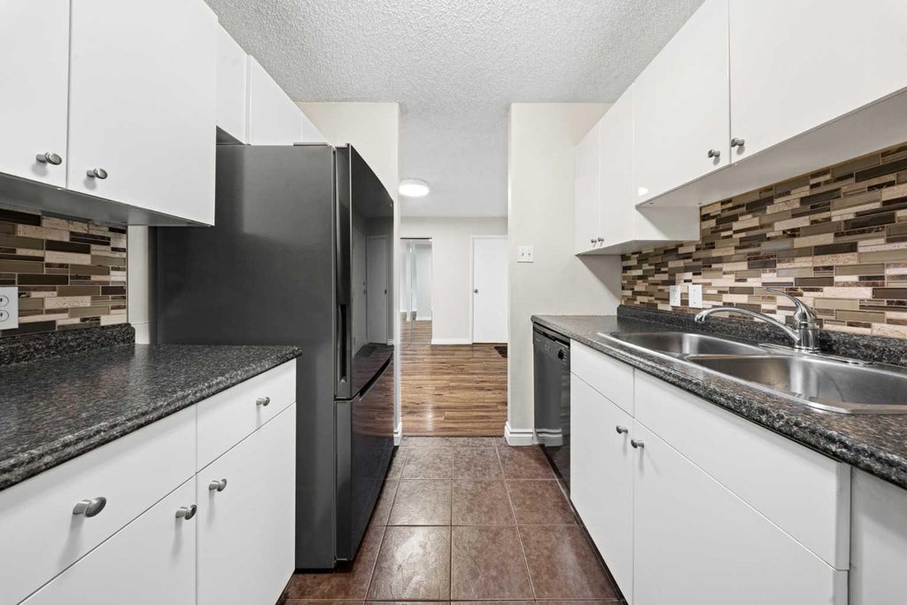 Photo of 718 12 Avenue SW #305, Calgary, AB T2R 0H7 (MLS # A2350564)