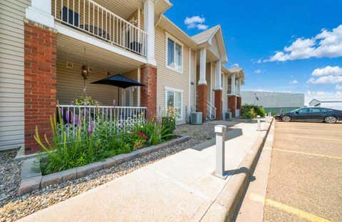 Photo of 10 Broadway Court NW #2, Redcliff, AB T0J 2P2 (MLS # A2333598)