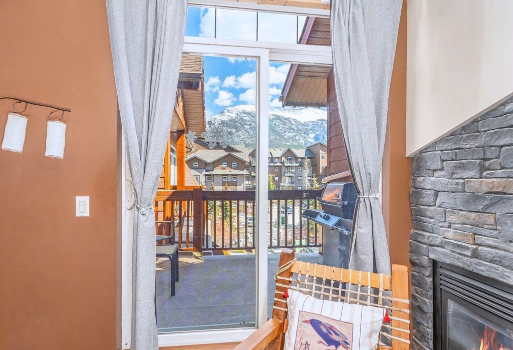 Photo of 190 Kananaskis Way #401, Canmore, AB T1W 3E9 (MLS # A2307498)