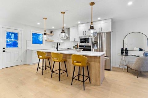 Photo of 1731 111 Avenue SW, Calgary, AB T2W 1R6 (MLS # A2330314)