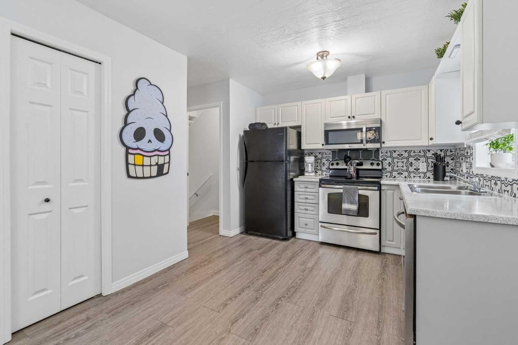 Photo of 123 Stonemere Place, Chestermere, AB T1X 1N1 (MLS # A2320782)