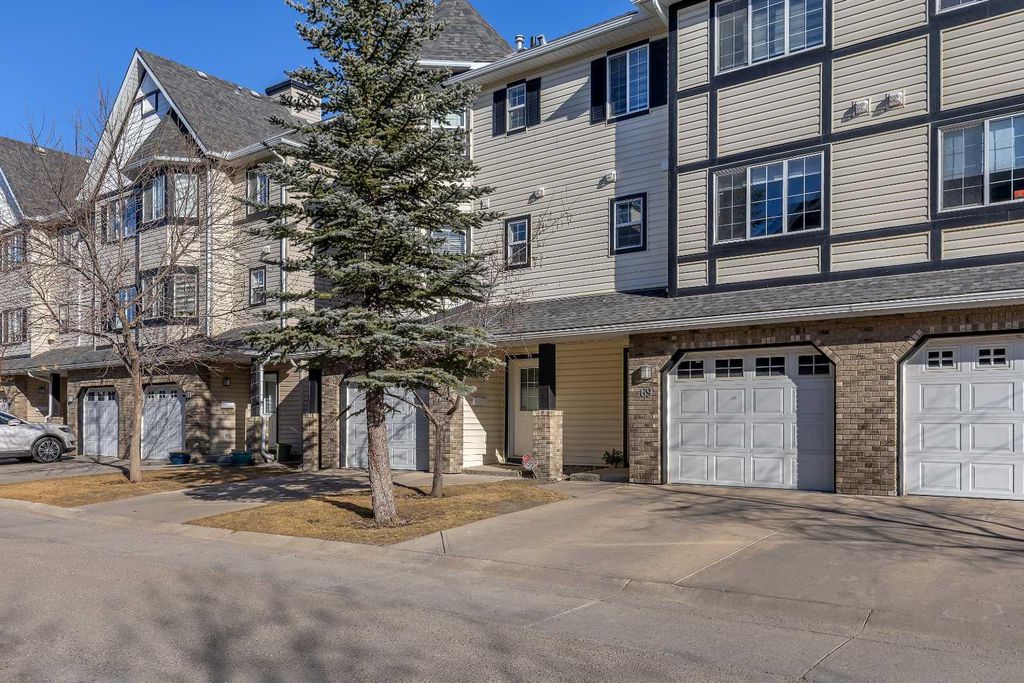 Photo of 69 Cougar Ridge Mews SW, Calgary, AB T3H 5P3 (MLS # A2286177)