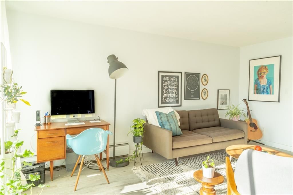 Photo of 523 15 Avenue SW #405, Calgary, AB T2R 0R3 (MLS # A2299359)