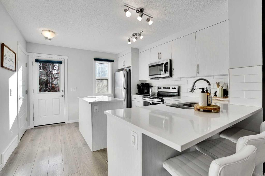 Photo of 128 Cranbrook Square SE, Calgary, AB T3M 3E3 (MLS # A2276848)